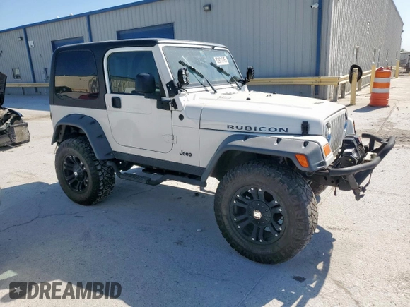 2004 Jeep Wrangler Rubicon z VIN 1J4FA69S34P757352, wystawiony jako Copart lot #52971745 z przebiegiem 139 855 mil mil oraz Szkoda całkowita • Salvage title. Historia ofert i sprzedaży dostępna na DreamBid. Obrazek 4.