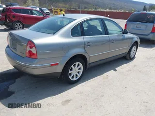 2004 Volkswagen Passat GLS z VIN WVWPD63BX4P205115, wystawiony jako IAAI lot #42039738 z przebiegiem 195 817 mil mil oraz . Historia ofert i sprzedaży dostępna na DreamBid. Obrazek 4.