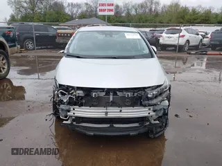 2021 Toyota Prius LE with VIN JTDKAMFP9M3170928, listed as a IAAI auction lot 42123934 with 58,293 mi miles and . Bid and sale history available at DreamBid. Image 13.
