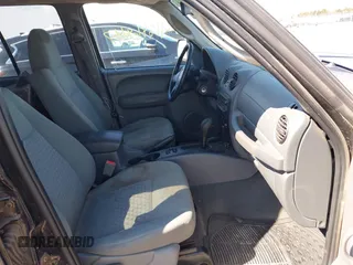 2005 Jeep Liberty Sport with VIN 1J4GL48K35W599784, listed as a IAAI auction lot 41886847 with 174,943 mi miles and . Bid and sale history available at DreamBid. Image 5.