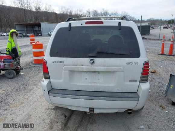 2005 Mercury Mariner Luxury with VIN 4M2CU57165DJ33059, listed as a IAAI auction lot 41675851 with 222,375 mi miles. Bid and sale history available at carsss.com. Image 16.