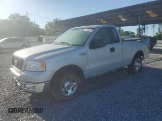 2005 Ford F-150 XL with VIN 1FTRF12W45NB13974, listed as a Copart auction lot 55701635 with 385,185 mi miles and Salvage title. Bid and sale history available at DreamBid. Image 1.