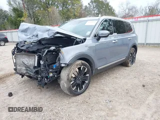 2023 Kia Telluride SX Prestige X-Line z VIN 5XYP5DGCXPG399768, wystawiony jako IAAI lot #41268192 z przebiegiem 19 284 mil mil oraz . Historia ofert i sprzedaży dostępna na DreamBid. Obrazek 18.