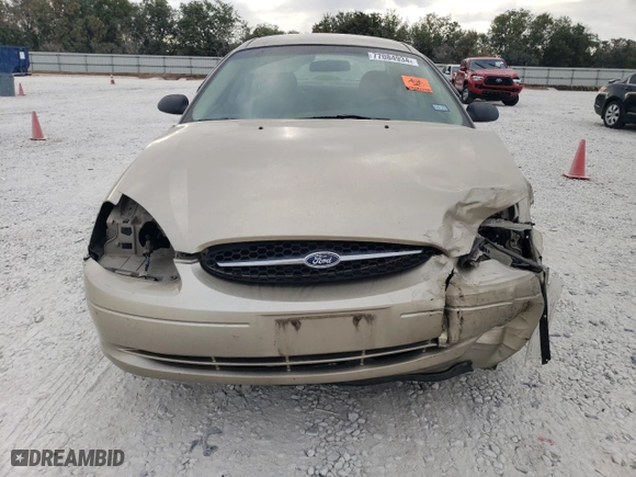 2001 Ford Taurus LX with VIN 1FAFP52U51A145880, listed as a Copart auction lot 77084934 with 54,143 mi miles and Salvage Title. Bid and sale history available at carsss.com. Image 5.