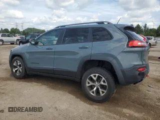 2015 Jeep Cherokee Trailhawk with VIN 1C4PJMBB1FW630715, listed as a Copart auction lot 58559675 with 58,302 mi miles and Salvage title. Bid and sale history available at DreamBid. Image 2.