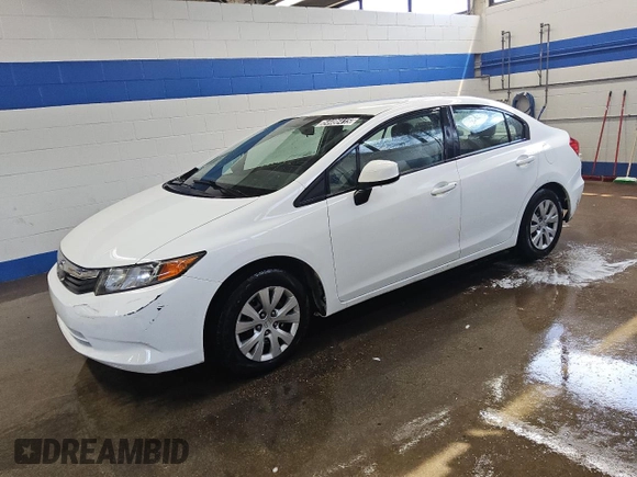 2012 Honda Civic LX z VIN 2HGFB2F50CH310377, wystawiony jako Copart lot #54486415 z przebiegiem 120 805 mil mil oraz Czysty tytuł • Clean title. Historia ofert i sprzedaży dostępna na DreamBid. Obrazek 1.