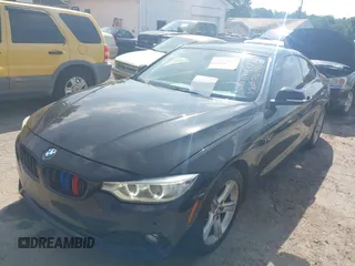 2014 BMW 4 Series 428i xDrive with VIN WBA3N5C52EF716998, listed as a IAAI auction lot 42548467 with 212,418 mi miles and . Bid and sale history available at DreamBid. Image 19.