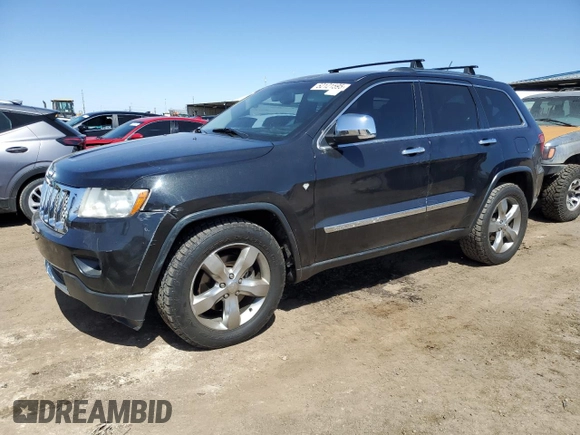 2011 Jeep Grand Cherokee Overland with VIN 1J4RR6GT4BC541497, listed as a Copart auction lot 52121595 with 143,010 mi miles and Clean title. Bid and sale history available at DreamBid. Image 1.