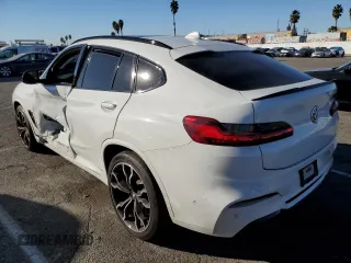 2020 BMW X4 M Competition z VIN 5YMUJ0C01L9C90351, wystawiony jako Copart lot #79907904 z przebiegiem Nie podano mil oraz Szkoda całkowita • Salvage title. Historia ofert i sprzedaży dostępna na DreamBid. Obrazek 2.