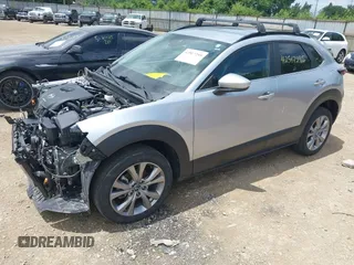 2021 Mazda CX-30 Select with VIN 3MVDMBBL1MM245514, listed as a IAAI auction lot 42517295 with 71,270 mi miles and . Bid and sale history available at DreamBid. Image 2.