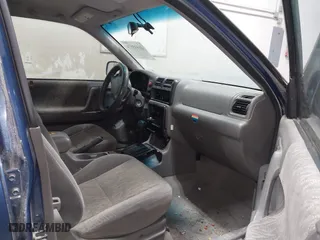 2003 Isuzu Rodeo with VIN 4S2CK58W634308515, listed as a IAAI auction lot 41843174 with 158,748 mi miles. Bid and sale history available at carsss.com. Image 5.