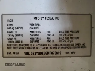 2021 Tesla Model Y Long Range with VIN 5YJYGDEE6MF075819, listed as a Copart auction lot 50903425 with 67,857 mi miles and Salvage Title. Bid and sale history available at DreamBid. Image 12.