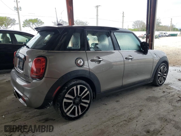 2021 MINI Hardtop 4 Door Cooper S with VIN WMWXU9C0XM2M90621, listed as a Copart auction lot 52513635 with 57,419 mi miles and Salvage title. Bid and sale history available at DreamBid. Image 3.