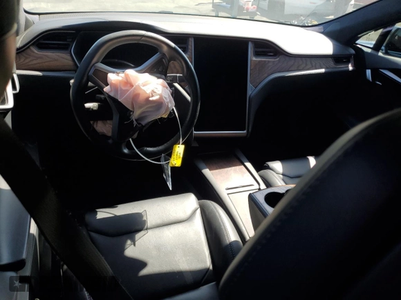 2019 Tesla Model S 75D with VIN 5YJSA1E2XKF305595, listed as a Copart auction lot 51838965 with Not provided miles and Salvage title. Bid and sale history available at DreamBid. Image 8.