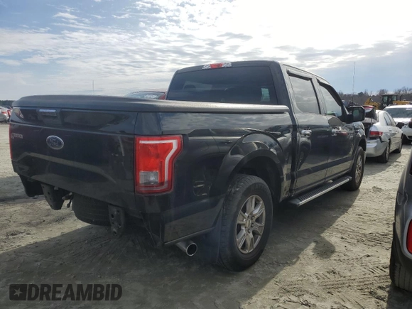 2015 Ford F-150 XL with VIN 1FTEW1CP7FFC11124, listed as a Copart auction lot 41777125 with 105,215 mi miles and Salvage title. Bid and sale history available at DreamBid. Image 3.