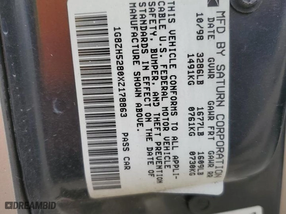 1999 Saturn SL with VIN 1G8ZH5280XZ178863, listed as a Copart auction lot 73660474 with 195,738 mi miles and Salvage Title. Bid and sale history available at carsss.com. Image 13.