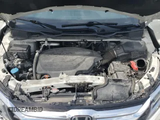 2019 Honda Odyssey Touring z VIN 5FNRL6H80KB501681, wystawiony jako Copart lot #58814945 z przebiegiem 105 287 mil mil oraz Szkoda całkowita • Salvage title. Historia ofert i sprzedaży dostępna na DreamBid. Obrazek 12.