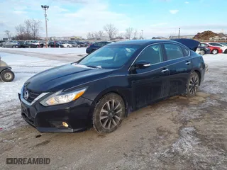 2018 Nissan Altima 2.5 SR with VIN 1N4AL3AP6JC230477, listed as a IAAI auction lot 41340437 with 126,335 mi miles. Bid and sale history available at carsss.com. Image 19.
