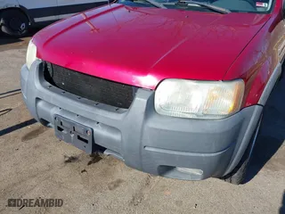 2003 Ford Escape XLT Popular 2 with VIN 1FMCU93183KC65571, listed as a IAAI auction lot 41768982 with 150,658 mi miles. Bid and sale history available at carsss.com. Image 6.