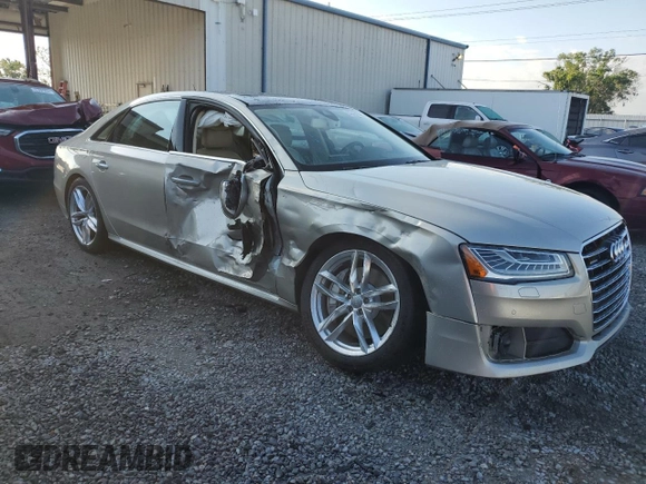2017 Audi A8 Sport with VIN WAU43AFD0HN002058, listed as a Copart auction lot 53180585 with 95,436 mi miles and Salvage title. Bid and sale history available at DreamBid. Image 4.