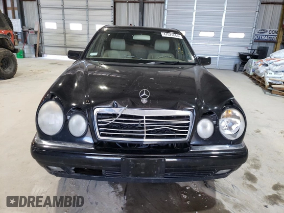 1998 Mercedes-Benz E-Class with VIN WDBJF65FXWA648112, listed as a Copart auction lot 47074665 with 0 mi miles and Salvage Title. Bid and sale history available at carsss.com. Image 5.