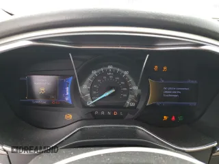 2013 Ford Fusion SE Hybrid z VIN 3FA6P0LU6DR174719, wystawiony jako Copart lot #62877715 z przebiegiem 52 884 mil mil oraz Szkoda całkowita • Salvage title. Historia ofert i sprzedaży dostępna na DreamBid. Obrazek 9.