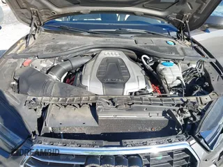 2016 Audi A7 3.0 Premium Plus with VIN WAUWGAFC2GN105498, listed as a IAAI auction lot 41488062 with 120,393 mi miles. Bid and sale history available at carsss.com. Image 10.