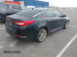 2013 Kia Optima SX with VIN 5XXGR4A63DG141938, listed as a IAAI auction lot 41760964 with 77,241 mi miles and . Bid and sale history available at DreamBid. Image 4.