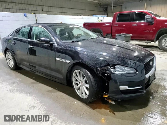 2016 Jaguar XJ R-Sport with VIN SAJWJ1CDXG8V99210, listed as a Copart auction lot 82693224 with 81,978 mi miles and Salvage title. Bid and sale history available at DreamBid. Image 14.