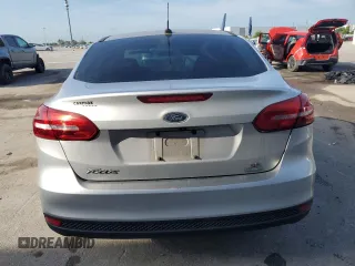 2017 Ford Focus SE with VIN 1FADP3FE9HL273889, listed as a Copart auction lot 53737055 with 114,700 mi miles and Salvage Title. Bid and sale history available at DreamBid. Image 6.