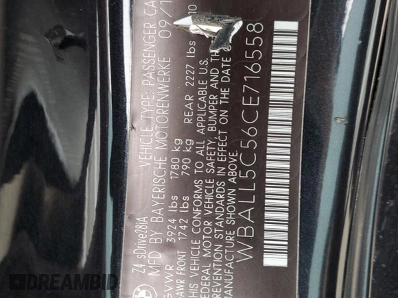 2012 BMW Z4 sDrive28i with VIN WBALL5C56CE716558, listed as a Copart auction lot 62003125 with 93,438 mi miles and Salvage title. Bid and sale history available at DreamBid. Image 12.