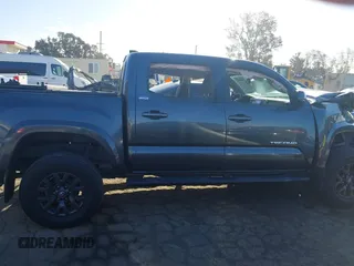 2020 Toyota Tacoma SR5 with VIN 3TMAZ5CN6LM139744, listed as a IAAI auction lot 41690662 with 68,053 mi miles and . Bid and sale history available at DreamBid. Image 14.