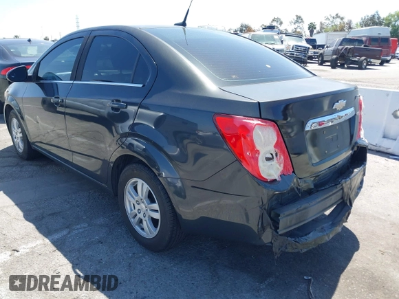 2014 Chevrolet Sonic LT with VIN 1G1JC5SB7E4146444, listed as a IAAI auction lot 42014386 with 85,122 mi miles and . Bid and sale history available at DreamBid. Image 3.
