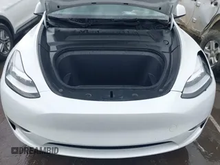 2022 Tesla Model Y Long Range with VIN 7SAYGDEE6NF461788, listed as a IAAI auction lot 41697064 with 34,034 mi miles and . Bid and sale history available at carsss.com. Image 10.
