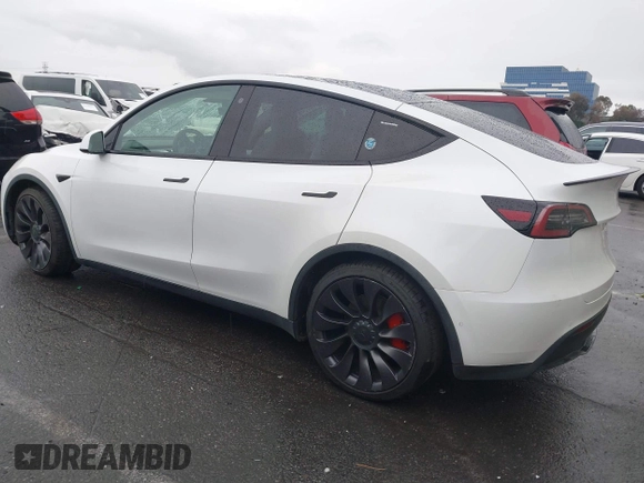 2021 Tesla Model Y Performance with VIN 5YJYGDEF2MF230374, listed as a IAAI auction lot 41708828 with 20,272 mi miles. Bid and sale history available at carsss.com. Image 3.