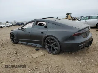 2021 Audi RS 7 z VIN WUAPCBF28MN901560, wystawiony jako Copart lot #84767714 z przebiegiem Nie podano mil oraz Szkoda całkowita • Salvage title. Historia ofert i sprzedaży dostępna na DreamBid. Obrazek 2.