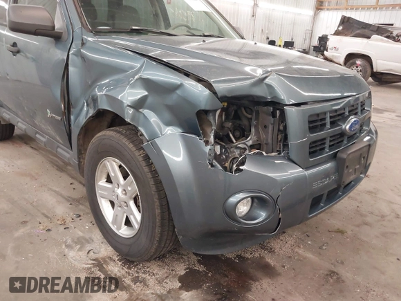 2011 Ford Escape Hybrid с VIN 1FMCU5K34BKC19603, выставлен на аукционе IAAI как лот 41895045 с пробегом 117 922 миль миль и . История ставок и продаж доступна на DreamBid. Изображение 6.