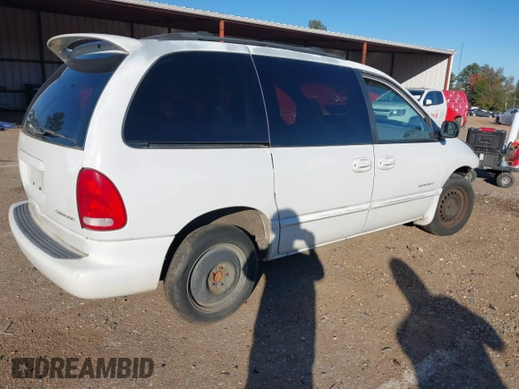 1999 Dodge Caravan SE with VIN 2B4GP45G0XR312100, listed as a IAAI auction lot 40966771 with 233,188 mi miles and . Bid and sale history available at carsss.com. Image 4.