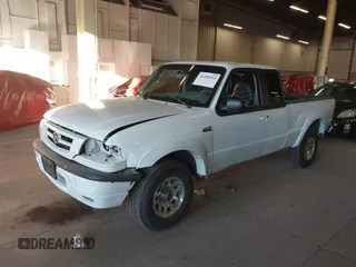 2002 Mazda B-Series 2WD Truck DS with VIN 4F4YR16V42TM25828, listed as a IAAI auction lot 41440414 with 132,334 mi miles. Bid and sale history available at carsss.com. Image 2.