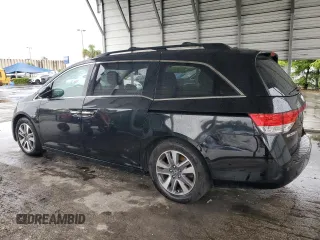 2015 Honda Odyssey Touring Elite с VIN 5FNRL5H91FB107793, выставлен на аукционе Copart как лот 59295355 с пробегом 91 910 миль миль и Списание • Salvage title. История ставок и продаж доступна на DreamBid. Изображение 2.