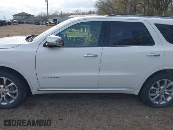 2016 Dodge Durango Citadel with VIN 1C4RDJEGXGC331569, listed as a IAAI auction lot 41933753 with 131,420 mi miles and . Bid and sale history available at DreamBid. Image 14.