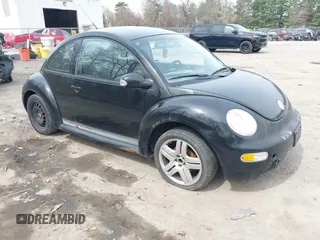 2004 Volkswagen New Beetle Coupe GL with VIN 3VWBK31CX4M416912, listed as a IAAI auction lot 42125377 with 999,999 mi miles. Bid and sale history available at carsss.com. Image 1.