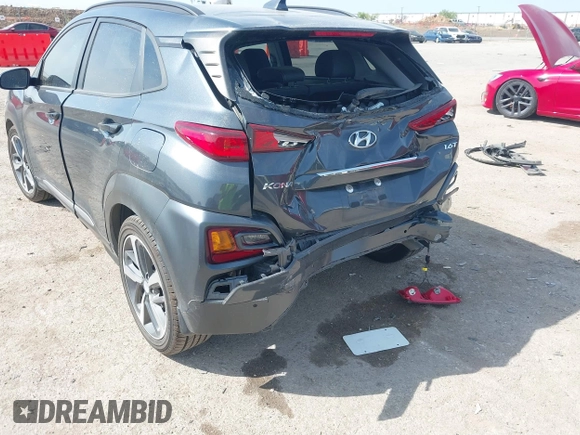 2021 Hyundai Kona Ultimate with VIN KM8K53A50MU601084, listed as a IAAI auction lot 41900099 with 56,171 mi miles. Bid and sale history available at carsss.com. Image 6.