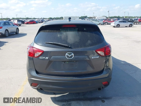 2015 Mazda CX-5 Touring with VIN JM3KE2CY9F0468199, listed as a IAAI auction lot 42099253 with 110,909 mi miles and . Bid and sale history available at carsss.com. Image 16.