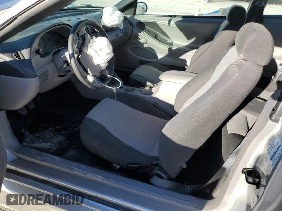 2003 Ford Mustang Standard z VIN 1FAFP40463F327722, wystawiony jako Copart lot #55042765 z przebiegiem 117 010 mil mil oraz Szkoda całkowita • Salvage title. Historia ofert i sprzedaży dostępna na DreamBid. Obrazek 7.