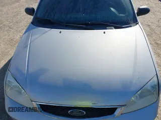 2007 Ford Focus S with VIN 1FAFP31N87W241707, listed as a IAAI auction lot 42019959 with Not Provided miles and . Bid and sale history available at carsss.com. Image 10.