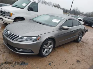 2013 Volkswagen CC Sport with VIN WVWBP7AN1DE520434, listed as a IAAI auction lot 41565789 with 273,503 mi miles. Bid and sale history available at carsss.com. Image 14.