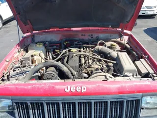 1996 Jeep Cherokee Sport with VIN 1J4FT68S0TL225719, listed as a IAAI auction lot 42121351 with 237,602 mi miles and . Bid and sale history available at DreamBid. Image 10.