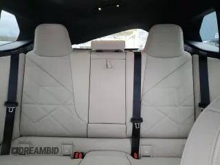 2025 BMW iX xDrive50 z VIN WB523CF09SCU44676, wystawiony jako Copart lot #47785405 z przebiegiem 18 mil mil oraz Tytuł czysty. Historia ofert i sprzedaży dostępna na DreamBid. Obrazek 10.