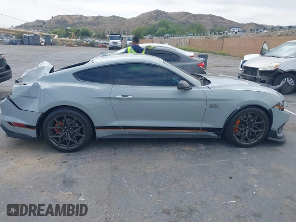2022 Ford Mustang Mach 1 with VIN 1FA6P8R08N5552580, listed as a IAAI auction lot 42140418 with 14,383 mi miles and . Bid and sale history available at DreamBid. Image 13.